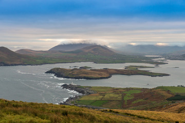 Beautiful view landscape seascape sunrise morning sunlight Valentia Island  Cromwell Point Lighthouse Portmagee Ring ok Kerry Ireland colors amazing splitting lights