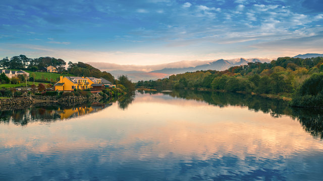 Spectacular view landscape mountain hill foggy day sunrise Killorglin Kerry Ireland red green forest