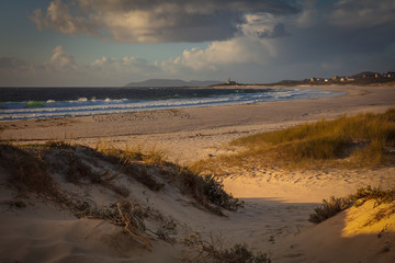 Fototapeta na wymiar Sunset on beach. Lariño, Galicia, Spain.