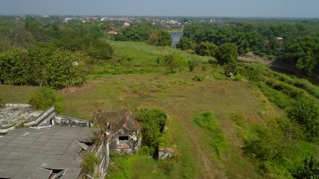 Green trees landscape view with Bengawan Solo riverside around Ngawi City, Java, Indonesia