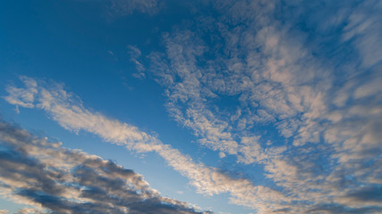 Naklejka na ściany i meble Clouds Across Sky in Evening 