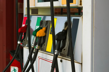 Gas station. Petrol pump in gas station. Filling the column with different fuels at the gas station.