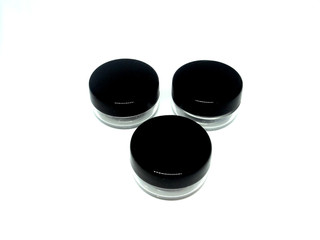 Obraz na płótnie Canvas Set of 3 black clear empty containers for skin care cosmetics or food storage 
