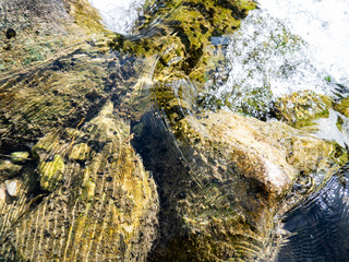 stream of crystalline water in river of stones