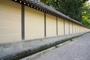 Fototapeta na wymiar Kyoto,Japan-September 26, 2019: Exterior walls of Kyoto Sento Imperial Palace and Omiya Palace in late summer 