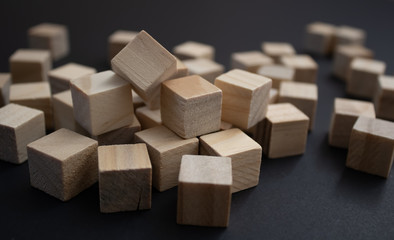 Wooden small blocks on the background. Background for desktop. Office style.Agile and scrum. Team...