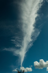 Naklejka na ściany i meble long cloud over deep blue ske