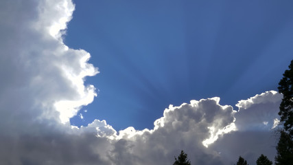 storm clouds and sun rays at yellowstone