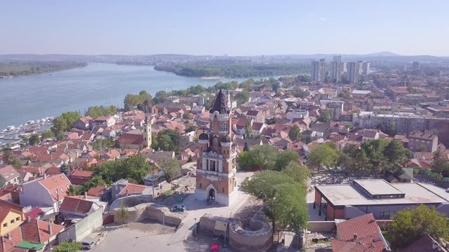 Slow fantastic aerial orbiting shot of Gardos Tower in Zemun Old city