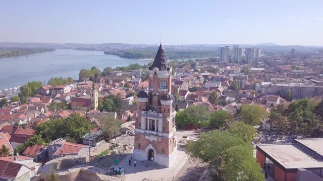 4k aerial orbiting shot of Gardos Tower in Zemun Old city, Danube river Belgrade