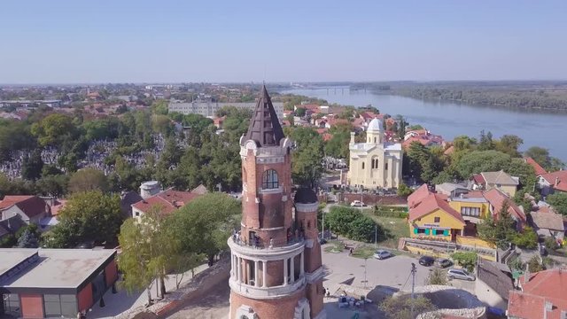 Interesting opening 4k aerial shot of Gardos Tower in Zemun Old city with blue Danube