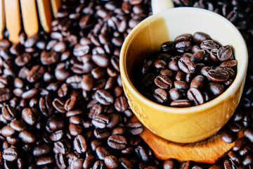Cup of coffee with coffee beans
