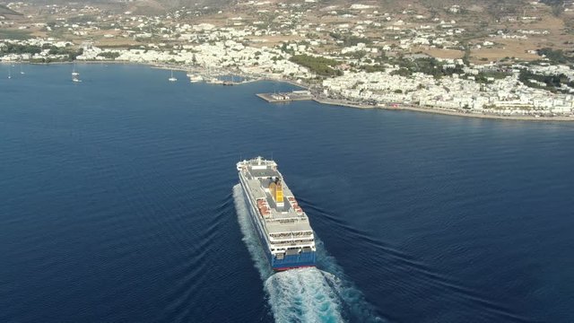 droneshot of paros harbor Parikia with ferryboat in Greece