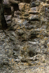 Cliffs and rock formations along the coastline of the Coromandel Peninsula