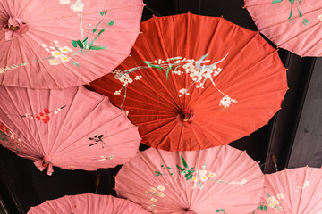 Chinese traditional umbrella display hanging on roof