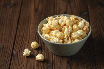 popcorn on the wooden table.