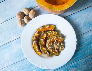 Pumpkin baked in the oven with honey and walnuts