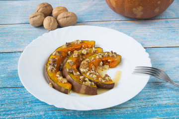 Pumpkin baked in the oven with honey and walnuts