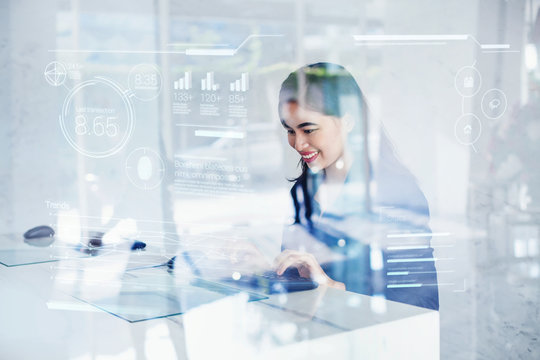 Asian Woman Using Futuristic Interface Of A Dashboard