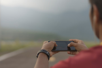 The men who exercise  smartphone use technology to help maintain an effective balance of workouts.