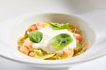 Ravioli with spinach, concasse and cheese espuma