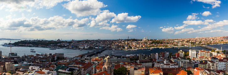 Fototapeta premium Aerial View from the Galata Tower in Istanbul, Turkey on a bright cloudy day.
