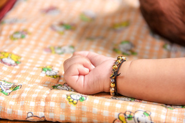 A close-up of little baby hand