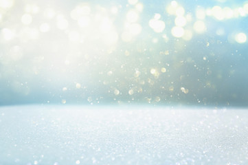 abstract glitter silver, gold , blue lights background. de-focused