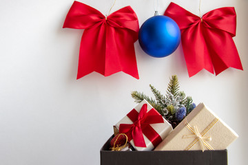 gift box with red ribbon and bow isolated on white