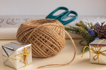 Scissors, paper, rope and other materials for the manufacture and packaging of gifts with their own hands for the holiday
