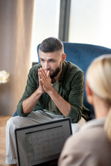 Man coming to psychologist after divorce with wife