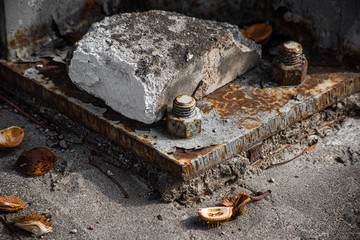 Fototapeta premium Bolts and nuts on a metal support with corrosion, soft focus