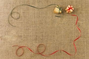 Cookies with colourful ribbons on table