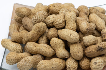 Roasted peanut shell on white background.
