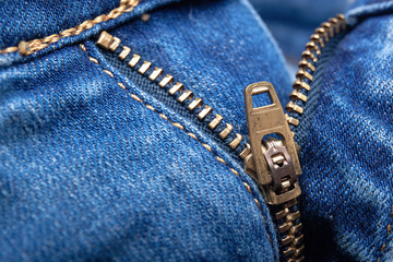 Blue jeans zipper. Close up shooting