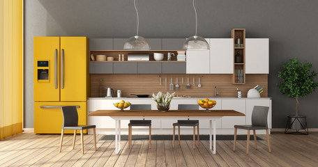 Modern kitchen with dining table
