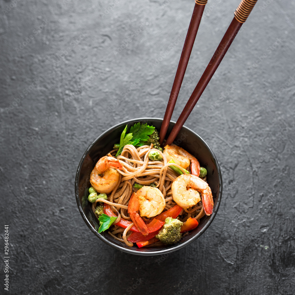 Poster stir fried soba and prawns