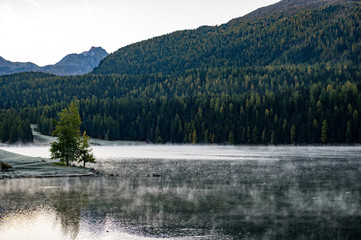 autumn morning mist over Lake St. Moritz