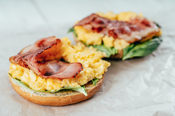 Breakfast Bagel With Scrambled Eggs, Spinach And Bacon