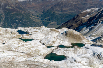 Lais da Macun im ersten Schnee im Herbst