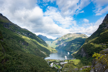 Fototapeta na wymiar Beautiful aerial landscape view Geiranger village, harbor and fjord in More og Romsdal county in Norway.