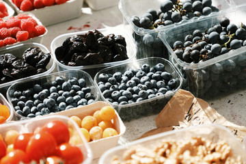 Boxes with berries and nuts from farmers market. Vienna