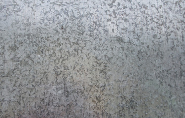 Texture of tin metal gray closeup.