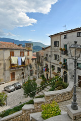 Province of Benevento, Italy, 09/15/2018. A road among the old houses of a mountain village.