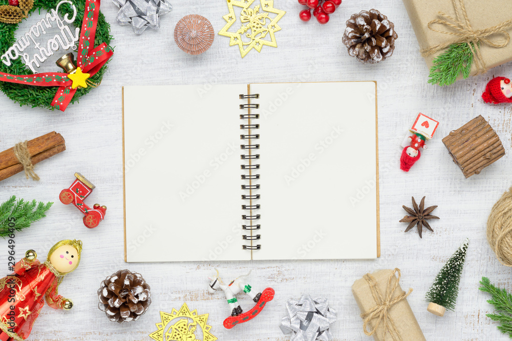 Aufkleber top view of blank notebook on white background with xmas decorations. mockup christmas background wi