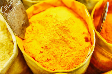 A variety of oriental condiments on the counter in the market. Close-up.