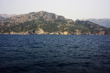Fototapeta premium View from the yacht to the Balearic Islands. Beautiful landscape in the Mediterranean Sea