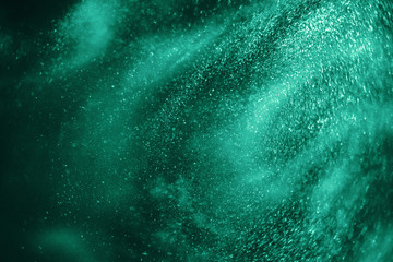 Abstract holiday mint glitter magic shimmering luxury background. Festive sparkles and lights. de-focused