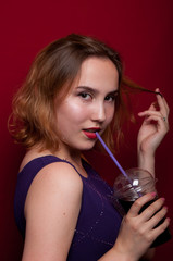 beautiful girl with French fries and drink