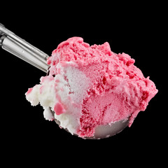 White pink ice cream in a scoop, close up